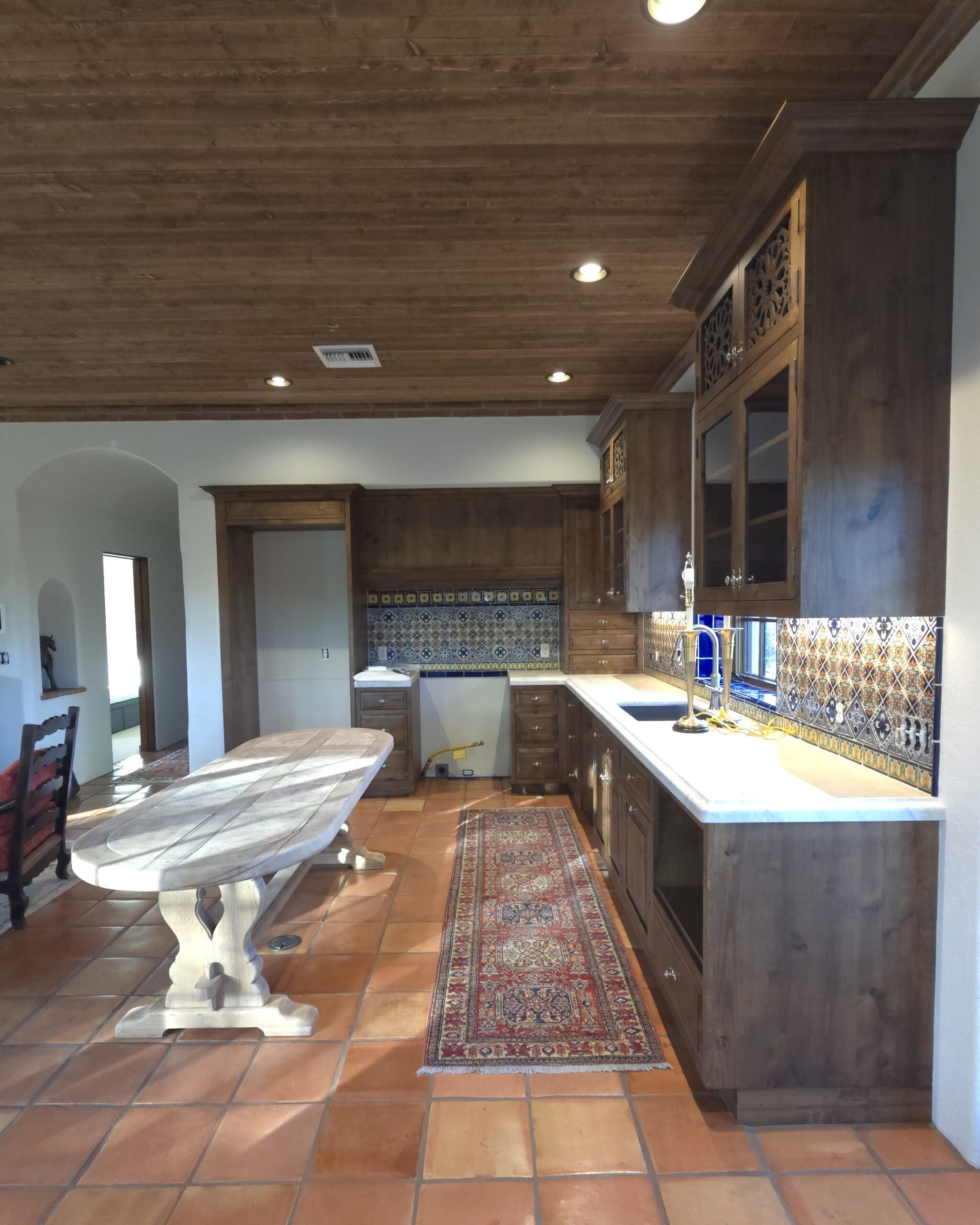 Rustic kitchen cabinetry by Westgate Woodworks